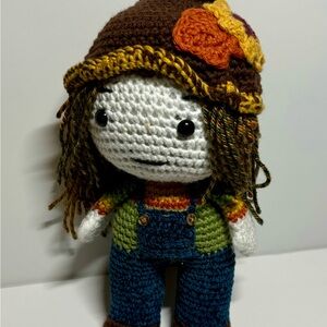Handmade Crochet Doll with Brown Hat and Colorful Outfit